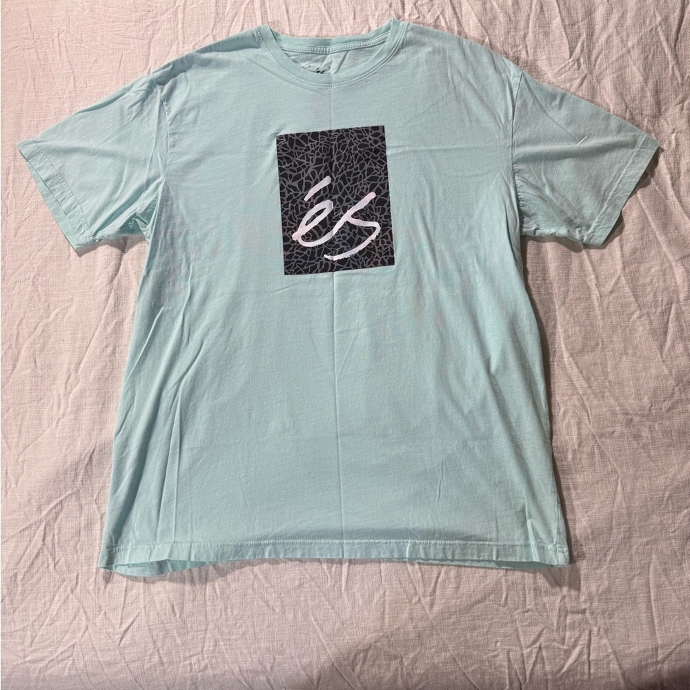 ES Skateboarding T-Shirt
Teal
Size XXL
New without tags